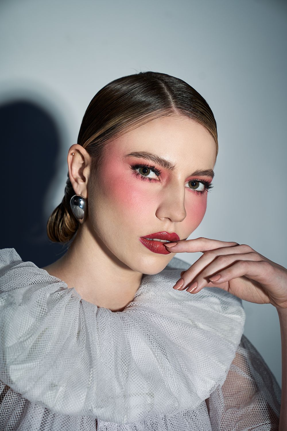 Editorial portrait with dramatic makeup